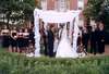 Under the chuppah in front of the Mansion
