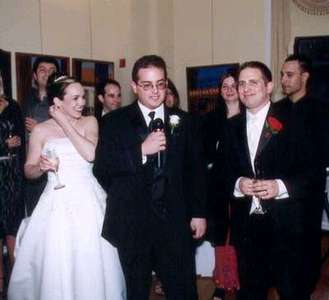 Dan and Steph with Adam during his best man speech