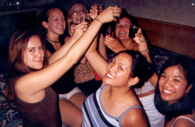 July 1999
Shots for everyone...celebrating Kim's 21st birthday in VA Beach, VA