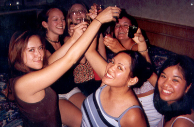 July 1999
Shots for everyone...celebrating Kim's 21st birthday in VA Beach, VA
