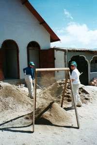 Pat and Jeannie sifting sand (4/11/02)