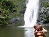 Swimming in a waterfall - Waipio Valley, Big Island