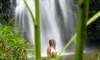 Swimming in Opeaka Falls (150' waterfall).  Wailua, Kauai