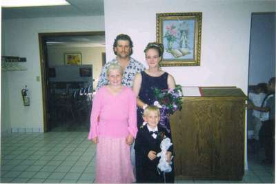Kristy's brother's wedding Sept 20, 2003.
Scott, Kristy, Emily and Cordell