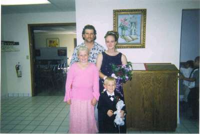 Kristy's brother's wedding Sept 20, 2003.
Scott, Kristy, Emily and Cordell