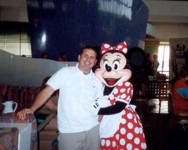 Dan posing with his favorite, Minnie.