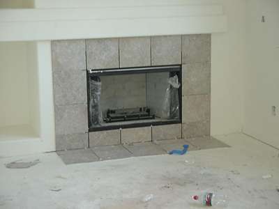 Sept. 12th.  the fireplace got it's tile today also... Big tile day! :)