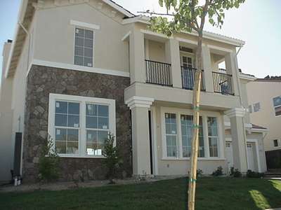 Sept. 22.  Another shot of the front.  We have the landscaping almost done and only the appliances and carpet are needed on the interior!!!!