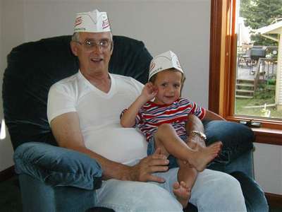 Grandpa John and Leo celebrate the opening of Krispy Kreme in Wisconsin.