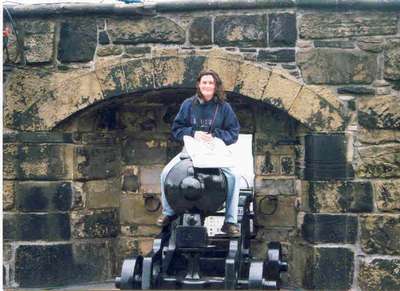 Melissa challenging a cannon in Scottland. (July 99)